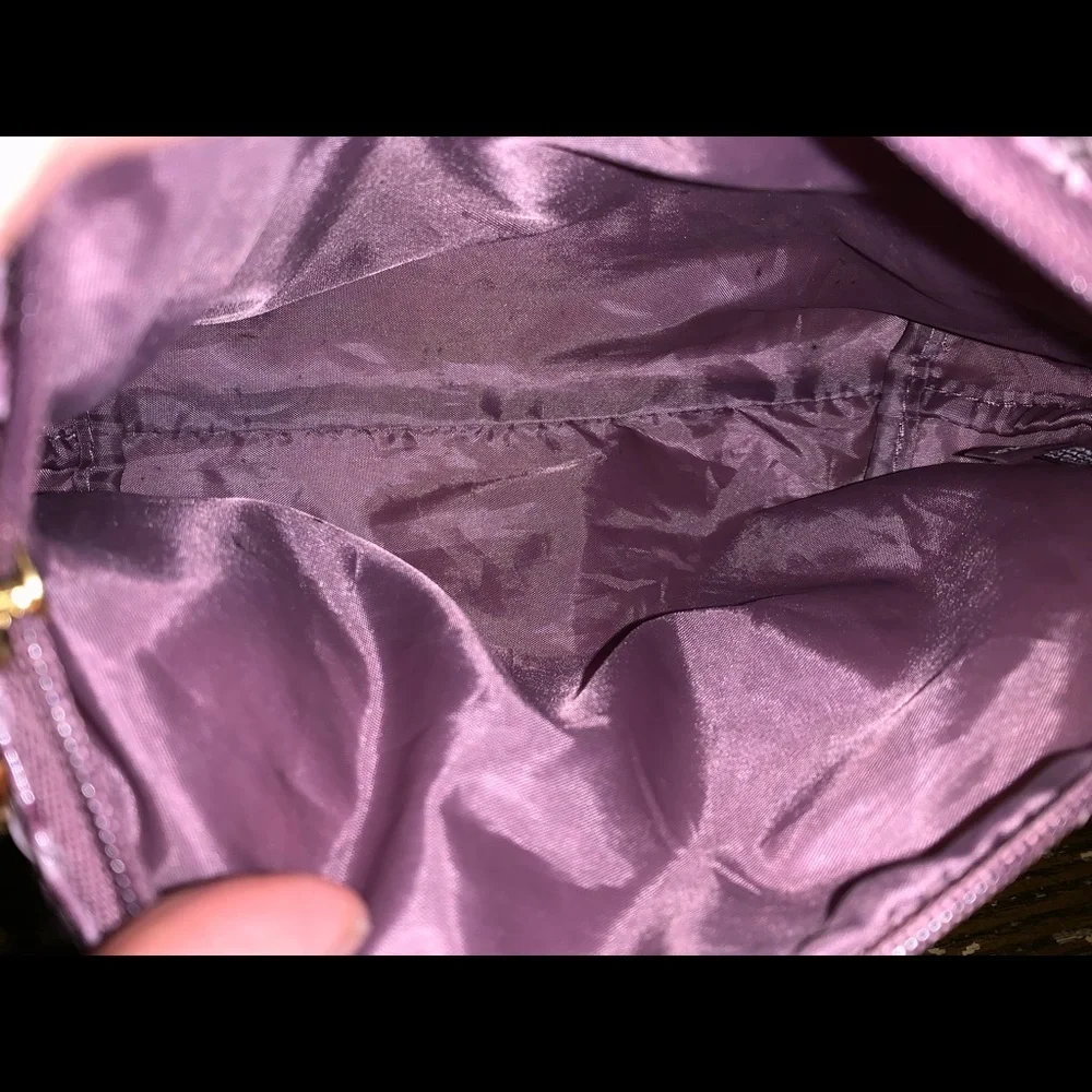 Estee Luader purple makeup bag